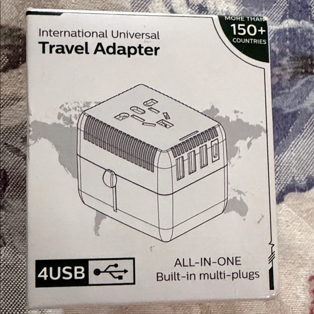 Universal Travel Adapter with 4 USB Ports - Black